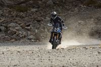 2025 BMW F 450 GS riding on gravel terrain