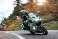 Kawasaki Ninja H2 SX SE riding two up on country road