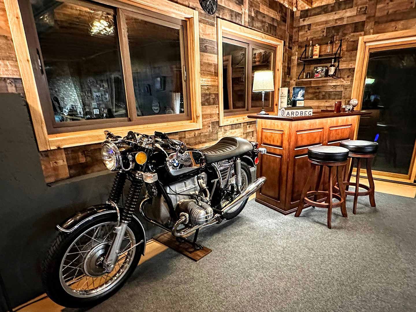 Nathan Hill’s BMW R50/5 holds court at his cozy basement bar.