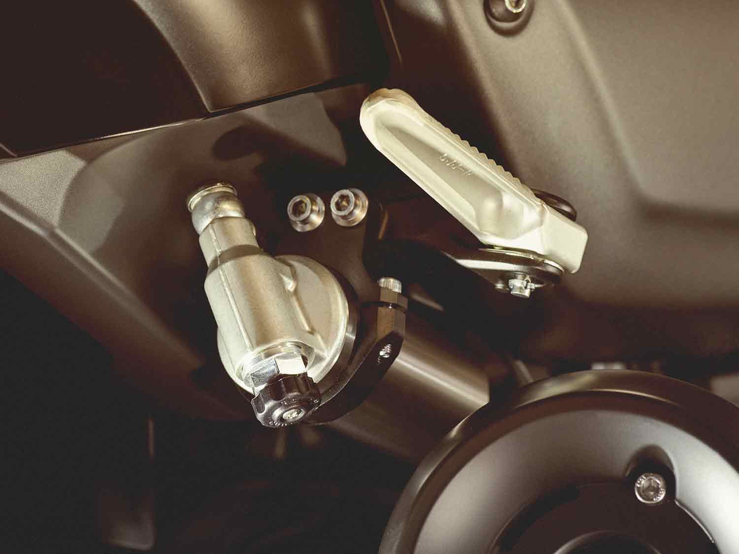 Yamaha wisely fitted an adjustable remote-reservoir shock to help calm the big bike’s movements.