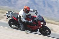 BMW S 1000 XR riding on race track