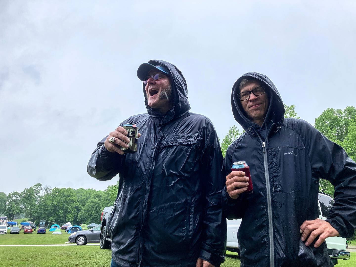 Rain, schmain. Properly dressed fans were out in force on Saturday. Un-properly dressed fans made do with pop-ups and other forms of shelter.