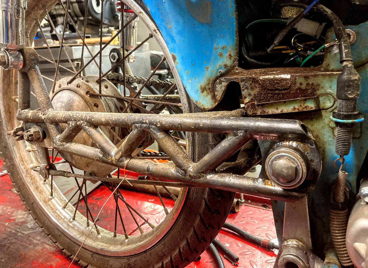 The pitbike game at Road America is real. Crafting a bespoke trellis swingarm for a vintage Honda Passport.