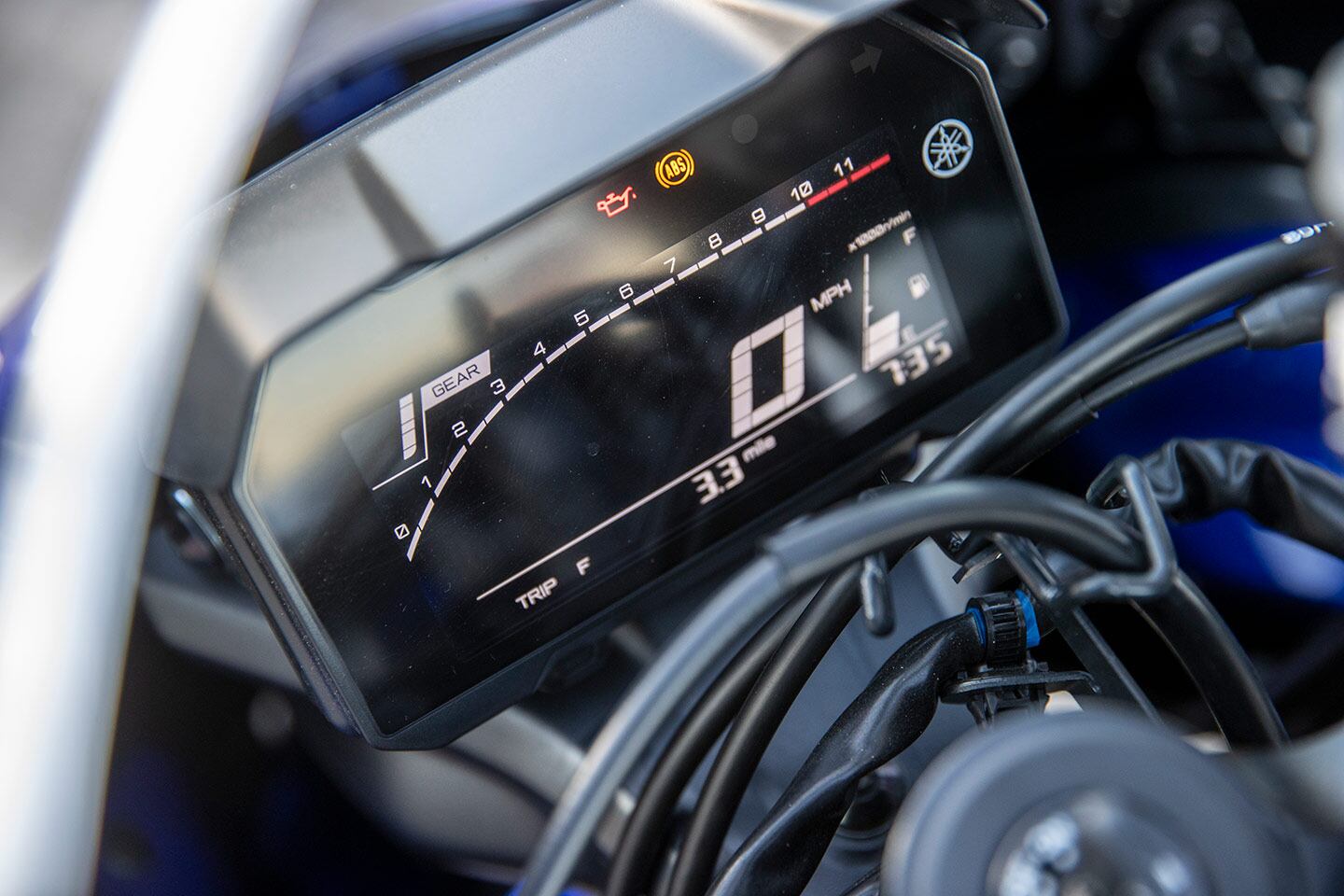 The Yamaha R7’s dash feels dated, while the bike lacks electronic rider aids.