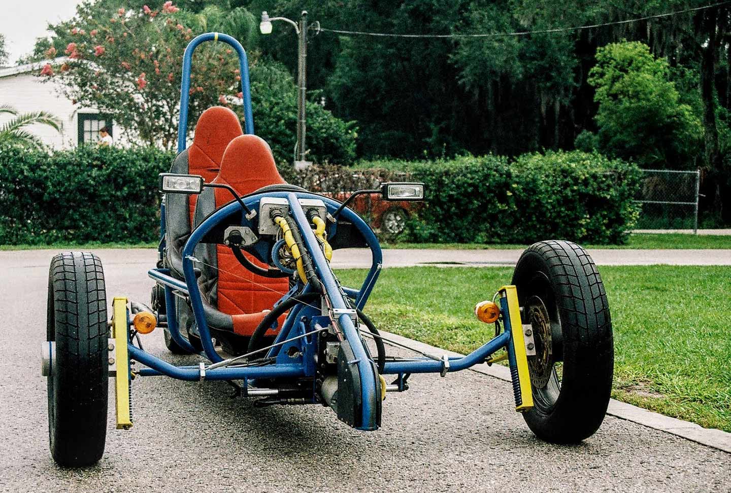 Although this is the second Tampa Trike prototype, production models will feature twin shocks. Note the lack of wishbone suspension, with traditional Ackermann steering geometry linkage. US patents 11,753,105 and 11,279,430.