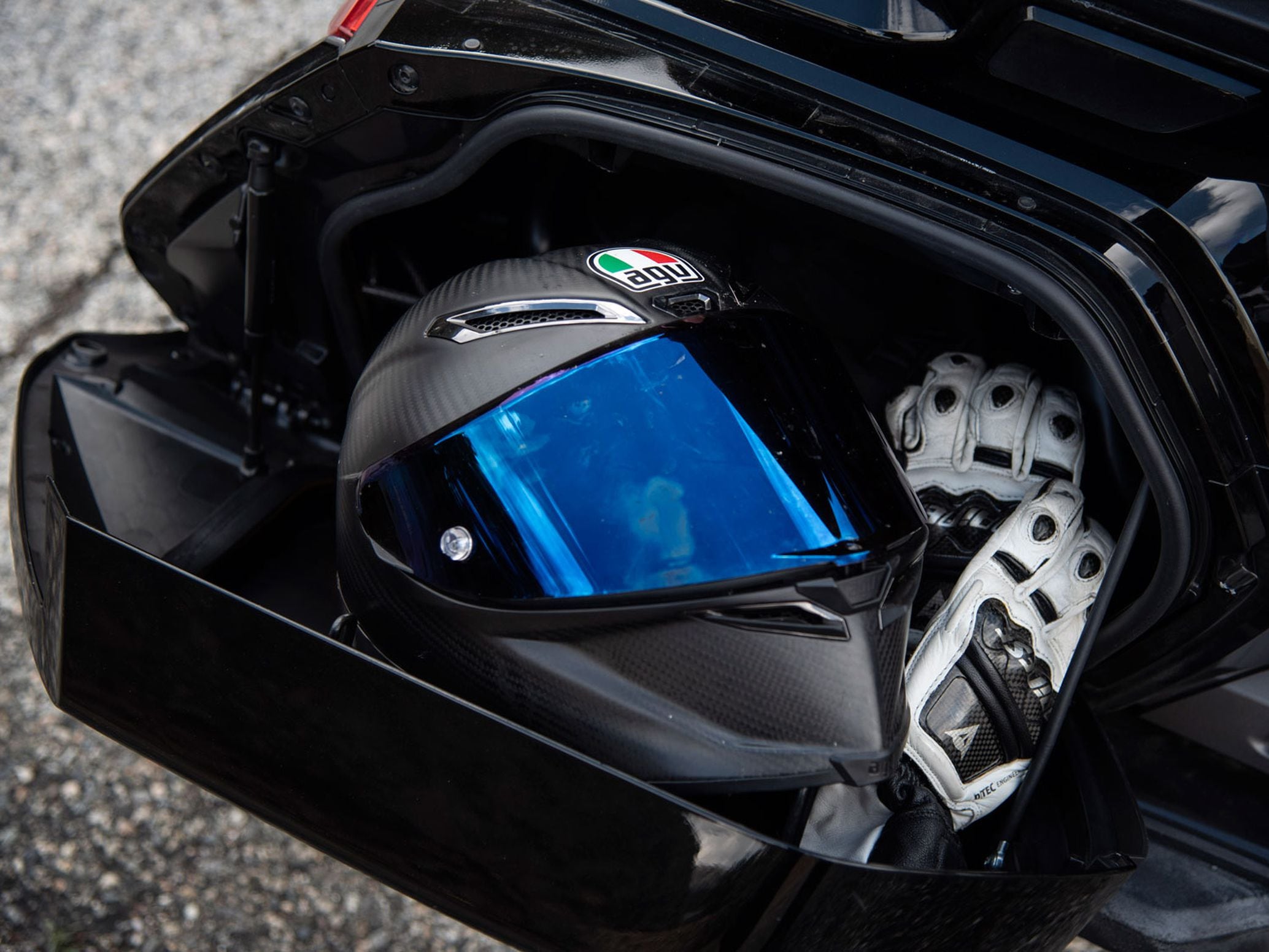 Each saddlebag is only about a cubic foot—not enough for a full-face helmet. But the Tour model adds a 1.76 cubic foot top case big enough for some helmets.